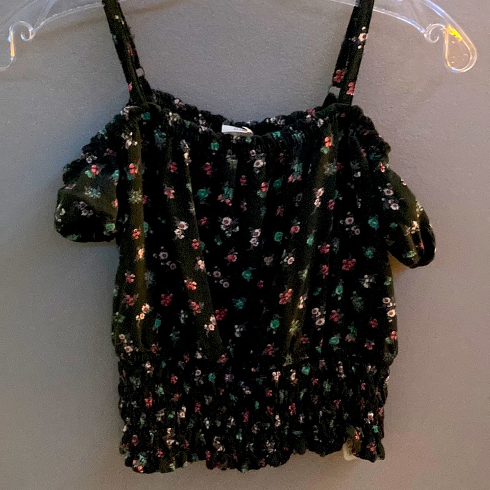from Adercrombie kids. 11-12.black, pinkish red, white, and greenish blue.